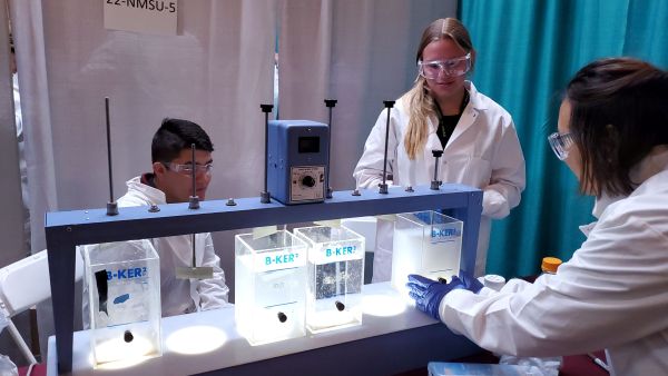 Students in white lab coats.