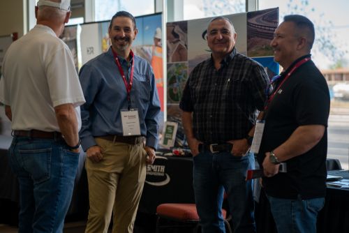 Three men tabling